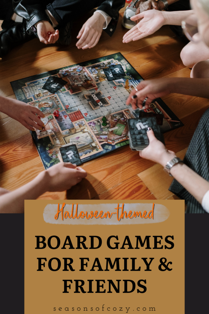 Pinnable pin of people playing a board games for halloween with text overlay. Halloween-themed board games for family and friends.
