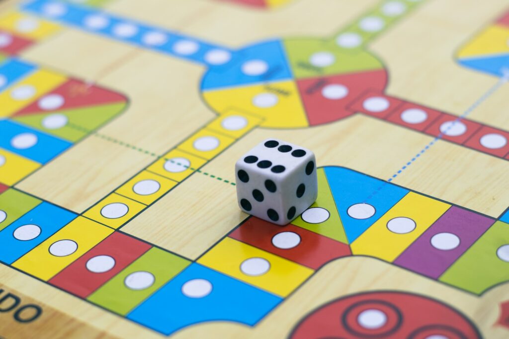 a close up of a dice on a board game